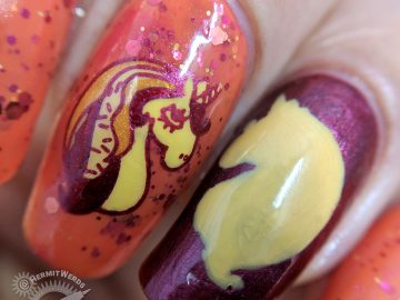 Crelly-corn - Hermit Werds - nail art of a crazy cool unicorn facing a unicorn silhouette against an orange crelly background