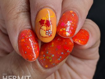 Cute little flower-shelled snail paired with a bright orange to nude crelly polish packed with colorful glitter.