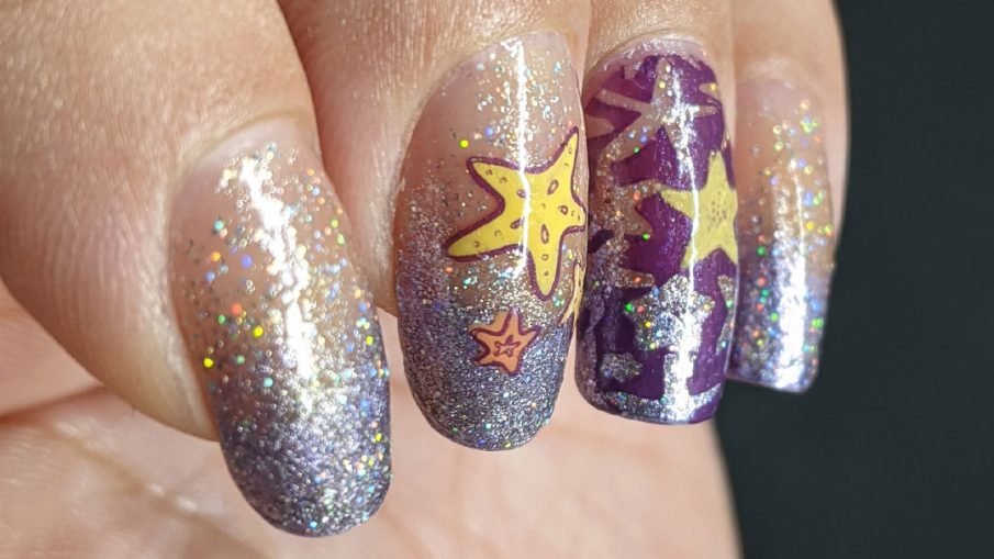 A purple baby boomer french tip nail art with a solar holographic glitter polish and starfish stamping decals on top.