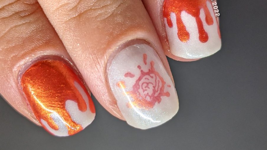 Orange and white bloody french tip drip nail art on a glow in the dark base with a bloody brain stamping decal.