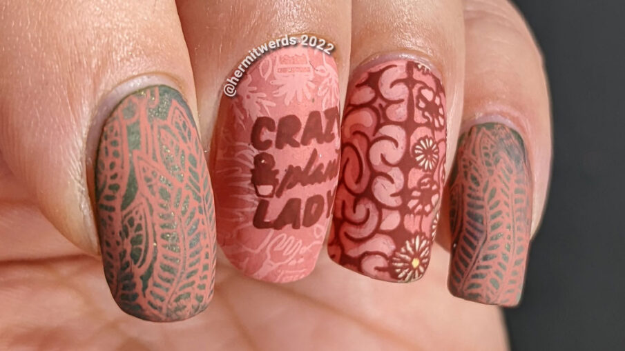 A salmon pink and green gardening nail art for people with plants on the brain. Actual brain and flower reverse stamping decals.