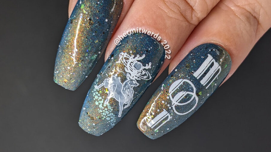 A deep blue and shimmery galaxy nail art celebrating the full buck moon with stamping decals of astral bucks leaping amongst the stars.A deep blue and shimmery galaxy nail art celebrating the full buck moon with stamping decals of astral bucks leaping amongst the stars.