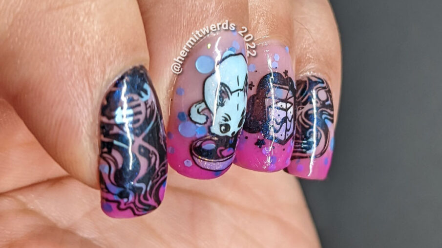 A space cat nail art with a cat drinking planet milk + UFO abducting a cat on a pink to white thermal with pink/purple/blue glitter.