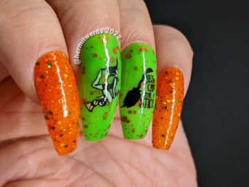 An orange & green Halloween nail art with stamping images of witches trick broom riding (their sticks) on a glow in the dark green polish.