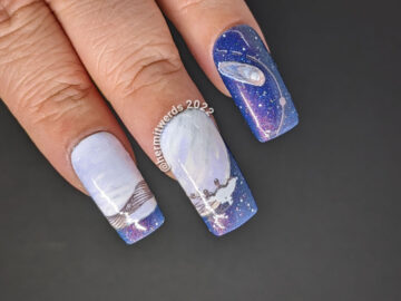 A blurple and shimmery Wolf Moon full moon mani featuring a wolf running past a giant moon into an outerspace filled with comets/satellites.