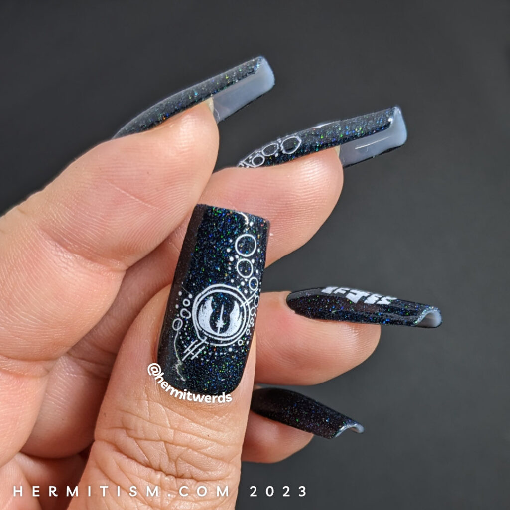 Star Wars nail art for the Rebel Alliance w/stamping images of "May the 4th Be With You", a rebel fighter, and the Jedi order's framed symbol.