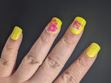 A bright yellow hibiscus and pineapple nail art with a "sexy" censored pineapple stamping decal to make it tropically funny.